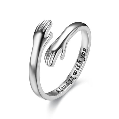 De ring die een liefdevolle knuffel symboliseert