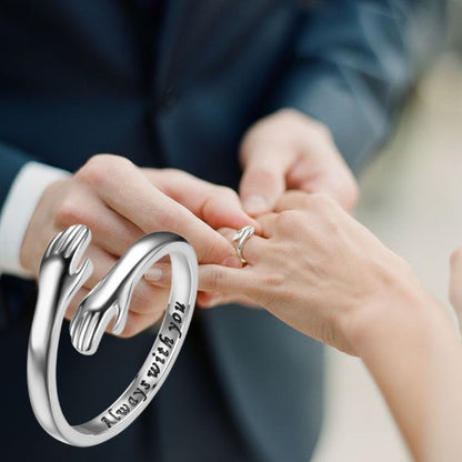 De ring die een liefdevolle knuffel symboliseert