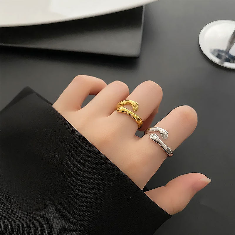 De ring die een liefdevolle knuffel symboliseert
