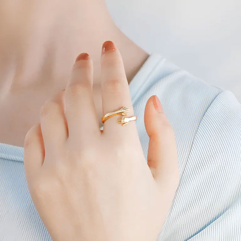 De ring die een liefdevolle knuffel symboliseert