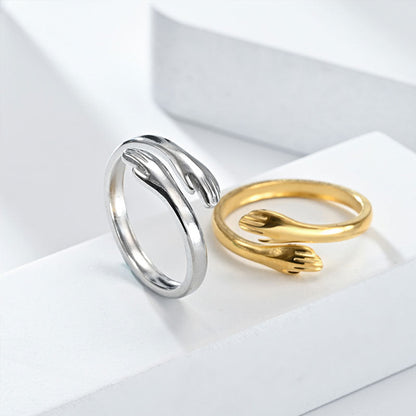 De ring die een liefdevolle knuffel symboliseert